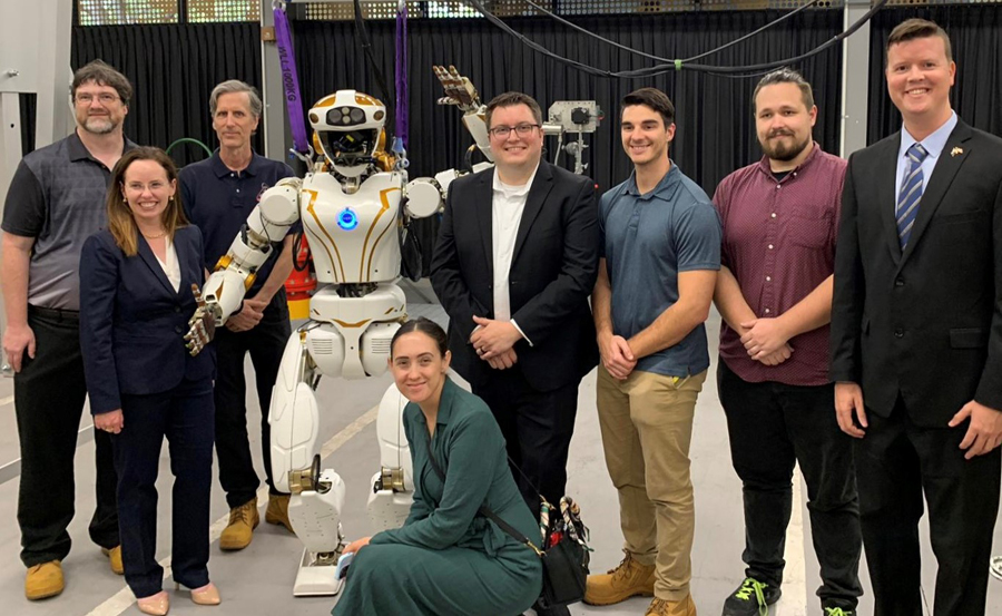 NASA’s Valkyrie robot is beginning a new mission half a world away from its home at the agency’s Johnson Space Center in Houston. As part of a reimbursable Space Act Agreement with Woodside Energy in Perth, Western Australia, NASA plans to use a Valkyrie robot to develop remote mobile dexterous manipulation capabilities to accommodate remote caretaking of uncrewed and offshore energy facilities. Woodside Energy will test the resulting software and provide data and feedback to NASA, helping accelerate the maturation of robotic technology. Under this second reimbursable collaboration with Woodside, Valkyrie will advance robotic remote operations capabilities which have potential to improve the efficiency of Woodside’s offshore and remote operations while also increasing safety for both its personnel and the environment. In addition, the new capabilities may have applications for NASA’s Artemis missions and for other Earth-based robotics objectives. NASA plans to leverage experience operating Valkyrie in Woodside’s facilities to learn how to better design robots for work in dirty and hazardous conditions, like those found on the Moon at the long-term worksites and habitats that will be established as part of future Artemis missions. Remotely operated mobile robots on the lunar and Martian surface could enable Earth-based operators to conduct important activities, even when astronauts are not physically present. These activities include inspection and maintenance of infrastructure and plants that leverage resources and materials to produce new items, enabling astronauts to live off the land. Woodside’s testing will also provide valuable data for NASA engineers on the use of advanced robots in similar terrestrial applications. “We are pleased to be starting the next phase of development and testing of advanced robotic systems that have the potential to positively impact life on Earth by allowing safer operations in hazardous environments,” says Shaun Azimi, lead of the dexterous robotics team at NASA Johnson. “These demonstrations will evaluate the current potential of advanced robots to extend the reach of humans and help humanity explore and work safely anywhere.” To deliver the robot, the NASA dexterous robotics team from Johnson traveled to the Woodside headquarters in Perth, Western Australia. The team prepared the Valkyrie robot and conducted training with the Woodside team on its operations. The work culminated in a visit with representatives from the government of Western Australia and the U.S. Consul General in Perth. Valkyrie and other advanced mobile robots can be vital tools in allowing humans to supervise dangerous work remotely and to offload dull and repetitive tasks, enabling humans to work on higher level tasks, including deploying and maintaining robots. These principles apply to both space and Earth, where companies are recognizing the value of human-scale robots. Using robots to enhance Artemis missions can help humanity build a long-term presence on the lunar surface and one day on other planets like Mars. Through domestic and international commercial partnerships, NASA is creating the next generation of human-scale robotic capabilities. Supporting Valkyrie’s development on Earth will create data and lessons learned that NASA teams will apply to current and future robotics and automation development for use in space. NASA will apply the software development work done on Valkyrie to upcoming hardware releases and perform operational demonstrations with Woodside as a part of the reimbursable collaboration in 2026-2027 to prove the robot’s capabilities in relevant remote, operational settings.