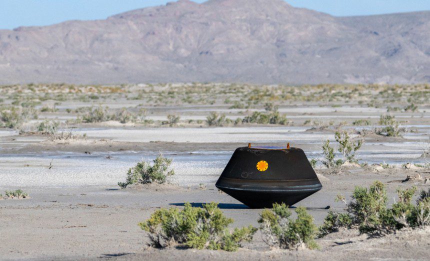 The sample return capsule from NASA’s OSIRIS-REx mission is seen shortly after touching down in the desert, Sunday, Sept. 24, 2023, at the Department of Defense's Utah Test and Training Range. The sample was collected from the asteroid Bennu in October 2020 by NASA’s OSIRIS-REx spacecraft. Photo Credit: (NASA/Keegan Barber)