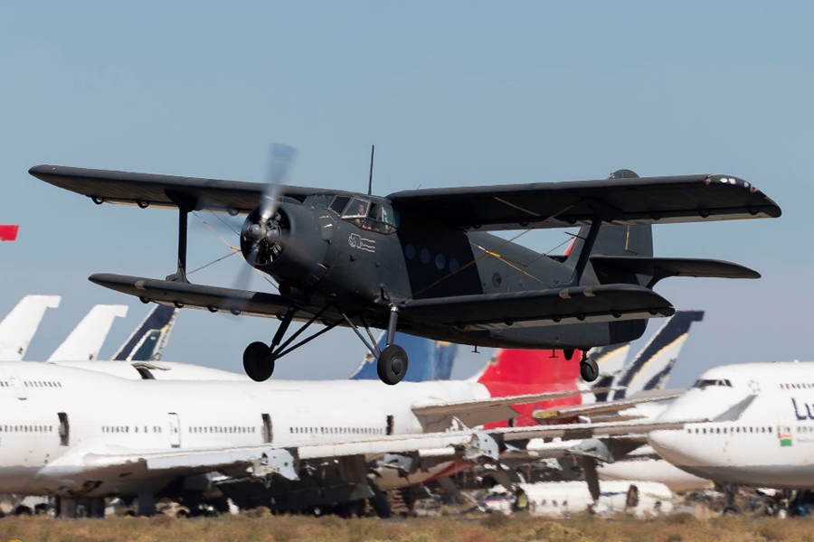 A color image of a AN-2 at takeoff.