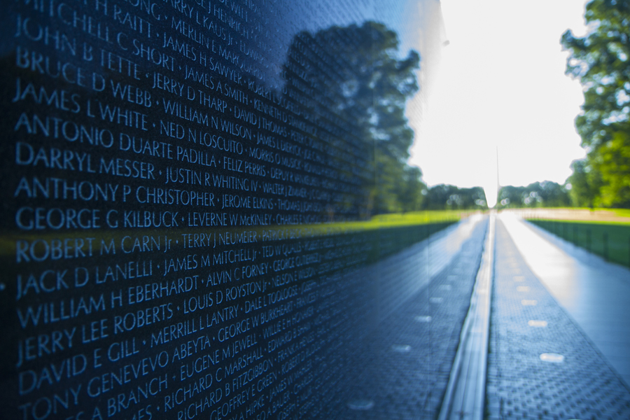 A close up of Vietnam Veterans Memorial Wall