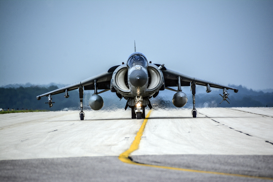 A color image of a front shot of the McDonnell Douglas AV-8B Harrier II on a tarmac.