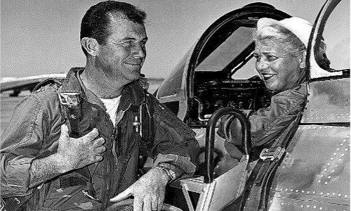 Chuck Yeager poses with Jackie Cochran next to a Canadair F-86, at Edwards AFB, Calif. Cochran became the first woman to break the sound barrier on May 18, 1953. 9Air Force photograph)
