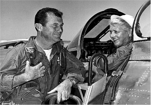 Chuck Yeager poses with Jackie Cochran next to a Canadair F-86, at Edwards AFB, Calif. Cochran became the first woman to break the sound barrier on May 18, 1953. 9Air Force photograph)