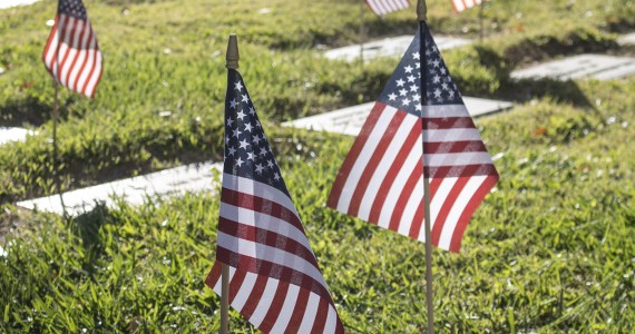 U.S. flags are placed at the graves of all veterans for the Lancaster Cemetery Veterans Day ceremony. (Photograph by Adrienne King