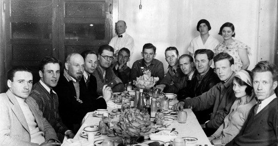 Aviator Charles Lindbergh (third from right) and pioneer aircraft builder Hawley Bowlus (fourth from right) join newsreel and print media photographers for a little party at the restaurant inside the Lebec Hotel after a day of glider flying near the Ridge Route. Aviators on the right, pressmen on the left. (Photograph by George Watson, courtesy of scvhistory.com)