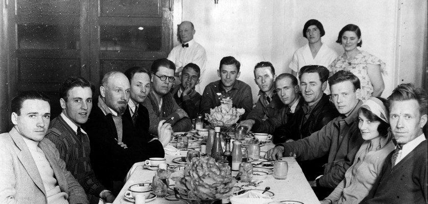 Aviator Charles Lindbergh (third from right) and pioneer aircraft builder Hawley Bowlus (fourth from right) join newsreel and print media photographers for a little party at the restaurant inside the Lebec Hotel after a day of glider flying near the Ridge Route. Aviators on the right, pressmen on the left. (Photograph by George Watson, courtesy of scvhistory.com)