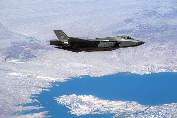 A U.S. Air Force F-35A Lightning II aircraft assigned to Luke Air Force Base, Arizona, flies alongside a KC-46 Pegasus assigned to Altus Air Force Base, Oklahoma, April 10, 2025. The KC-46 refueled the F-35s to extend their training mission and support aerial refueling qualification for new pilots. (U.S. Air Force photo by Airman 1st Class Jonah Bliss)