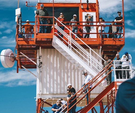 Community leaders observe from an air traffic control tower at range two during Haboob Havoc, March 29, 2025, at Barry M. Goldwater Range, Arizona. Haboob Havoc is a total force competition that provides a way for pilots to demonstrate their skills across a diverse range of aircraft while also testing their abilities in different mission sets such as dogfighting and gun runs. (U.S. Air Force photo by Senior Airman Katelynn Jackson)