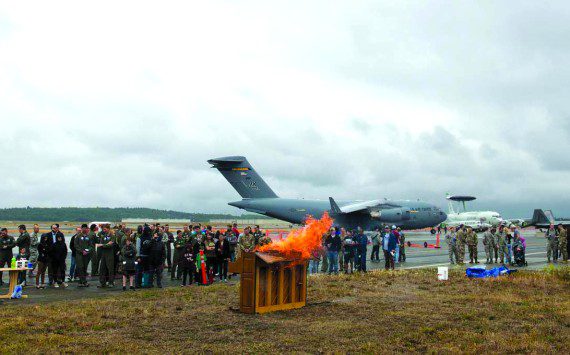 A piano is burned during the 3rd Wing’s 100th anniversary celebration at RAF Mildenhall in England to honor the wing’s fallen aviators. U.S. aviators witnessed the tradition during World War II and brought the tradition to America. (Air Force photograph)