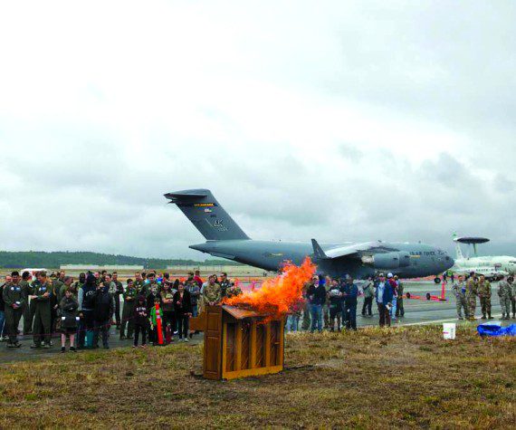 A piano is burned during the 3rd Wing’s 100th anniversary celebration at RAF Mildenhall in England to honor the wing’s fallen aviators. U.S. aviators witnessed the tradition during World War II and brought the tradition to America. (Air Force photograph)
