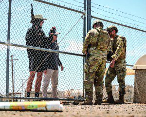 U.S. Air Force Airmen assigned to the 56th Fighter Wing, participate in a final hands-on training, May 2, 2025, at Luke Air Force Base, Arizona. To simulate real-world challenges, base volunteers role-played as both helpful good Samaritans and hostile enemies. This dynamic environment required the Airman Leadership School students to apply their newly learned skills in de-escalating tense encounters and establishing secure guarded perimeters. 