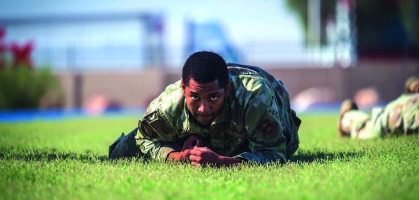 U.S. Air Force Airman 1st Class Jaylen Craig, 56th Security Forces Squadron defender, high crawls during the 2025 Police Week Defender Challenge, May 13, 2025, at Luke Air Force Base, Arizona. The Defender Challenge consists of various strength and endurance trials, including tire flips, casualty movements, and ammo can presses. The Defender Challenge is part of National Police Week, which honors the men and women of law enforcement agencies around the country, while remembering those who gave their lives in service. U.S. Air Force photos by Senior Airman Jakob Hambright