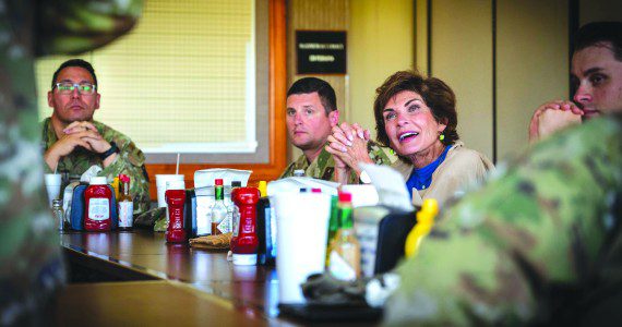 Janine Sijan-Rozina, Capt. Lance P. Sijan’s sister, speaks with U.S. Air Force Airmen assigned to the 56th Fighter Wing during a lunch event held in honor of her brother, Medal of Honor recipient Capt. Lance Sijan, May 16, 2025, at Falcon Dunes Golf Course, Luke Air Force Base, Arizona. Capt. Lance Sijan died while being held as a prisoner of war during the Vietnam War, and he is the first Air Force Academy graduate to receive the Congressional Medal of Honor. His sister, Janine, frequently visits Air Force installations to retell the story of her brother’s heroism and sacrifice. (U.S. Air Force photos by Senior Airman Jakob Hambright)
