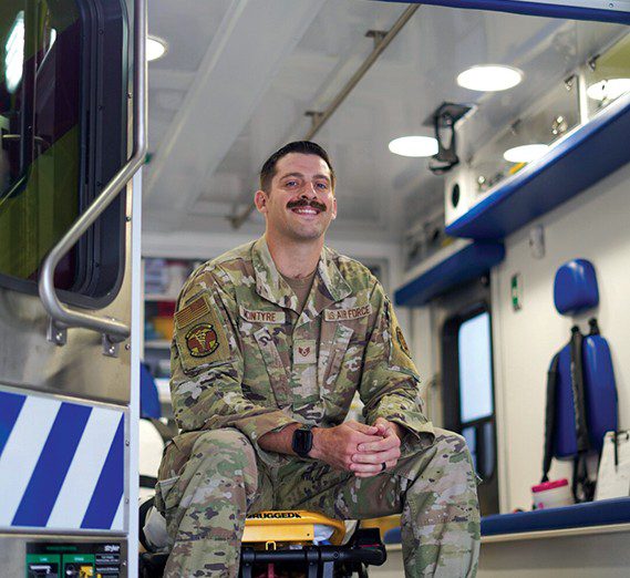 Paramedic Staff Sgt. Kenneth McIntyre sits inside an ambulance at Mike O’Callaghan Military Medical Center, Nellis Air Force Base, Nev. (Air Force photograph by Robyn Stulgaitis)