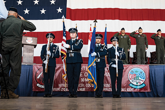 U.S. Air Force Honor Guard members assigned to the 56th Fighter Wing present the colors during the 425th Fighter Squadron Change of Command Ceremony, May 30, 2025, at Luke Air Force Base, Arizona. The 425th FS, also known as the “Black Widows,” was activated at Luke AFB on Dec. 30, 1992. This squadron operates with a composition of U.S. Airmen and RSAF military and civilian personnel, a first of its kind at Luke AFB. (U.S. Air Force photos by
A1C Belinda Guachun-Chichay)