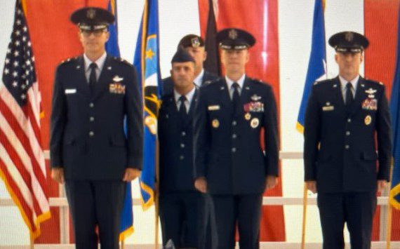 The 412th Test Wing change of command saw Brig. Gen. Douglas P. Wickert, center, command to his successor, Col. Thomas M. Tauer, right. Presiding over there ceremony was Maj. Gen. Scott A. Cain, commander of the Air Force Test Center. The ceremony was held at Edwards AFB, Calif., July 29, 2025. (Air Force photograph)