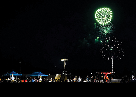 Luke Air Force Base community members enjoy the fireworks at the 2025 Freedom Fest, July 3, 2025, at Luke AFB, Arizona. Freedom Fest brings the Luke AFB community together to celebrate Independence Day.