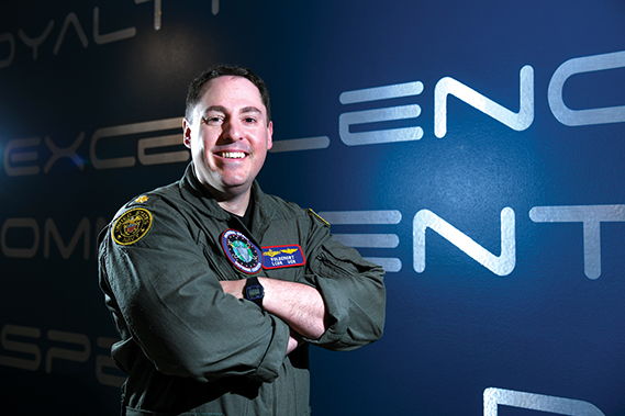 U.S. Navy Lt. Cdr. Matthew Dring, National Space Defense Center operations integrations chief, poses for a photo at Schriever Space Force Base, Colo., April 18, 2025. Dring was selected as one of the first Navy officers to attend the weapons instructor course at the U.S. Air Force Weapons School’s 328th Weapons Squadron. (Space Force photograph by Tiana Williams)