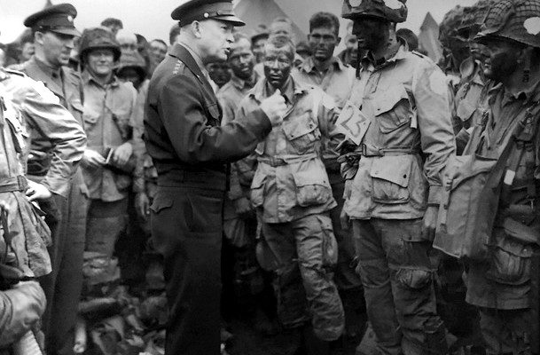 Gen. Dwight D. Eisenhower meets 101st Airborne troops before D-Day. Army photograph
