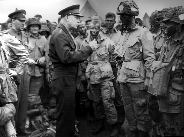 Gen. Dwight D. Eisenhower meets 101st Airborne troops before D-Day. Army photograph