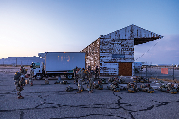 Soldiers from the Tarantula Team, Operations Group, National Training Center, out of Fort Irwin, California, prepare to board a C-17 assigned to the 418th Flight Test Squadron at Barsttow-Dagget Airport, June 5. (Air Force photo by James West)